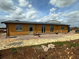 TBS177 Lodge Log Cabin | 15.5x6.3m - Timber Building Specialists